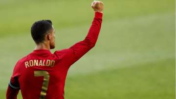 Portugal's Cristiano Ronaldo celebrates after scoring his side's second goal during the international friendly soccer match between Portugal and Israel at the Alvalade stadium in Lisbon, Wednesday, June 9