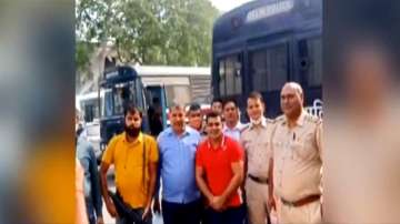 Murder accused Olympic medallist wrestler Sushil Kumar and Delhi Police personnel were seen during a photo session.