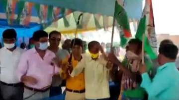 Today, in the Birhum district, 150 BJP workers were thoroughly sprayed with sanitiser before being handed the Trinamool flag.