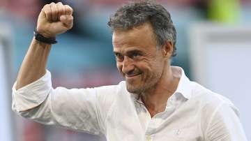 Spain's manager Luis Enrique celebrates at the end of the Euro 2020 soccer championship round of 16 match between Croatia and Spain at the Parken Stadium in Copenhagen, Monday June 28