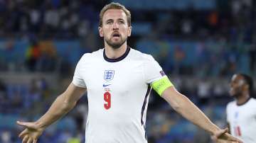 England's Harry Kane celebrates after scoring his side's third goal during the Euro 2020 soccer championship quarterfinal match between Ukraine and England at the Olympic stadium in Rome, Saturday, July 3
