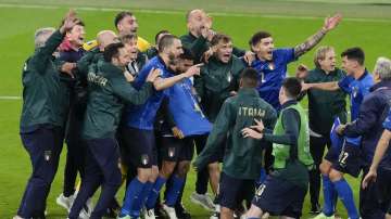 Italy celebrates after defeating Spain in their Euro 2020 soccer championship semifinal at Wembley stadium in London, Tuesday, July 6