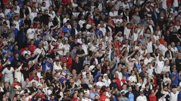 England fans cheer during the Euro 2020 final soccer match between Italy and England