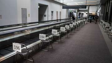 Chairs are numbered in the holding area for foreign visitors at the Narita International Airport on July 10, 2021, in Narita, near Tokyo.