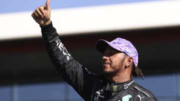 Mercedes driver Lewis Hamilton of Britain gives a thumbs up after the Sprint Qualifying of the British Formula One Grand Prix, at the Silverstone circuit, in Silverstone, England, Saturday, July 17