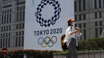 Japan expands virus emergency after record spikes amid Tokyo Olympics