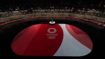 The floor of Olympic Stadium is lit before the start of the opening ceremony at the 2020 Summer Olympics, Friday, July 23, 2021