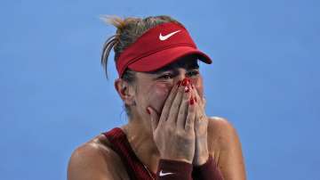 Belinda Bencic, of Switzerland, becomes emotional after defeating Elena Rybakina, of Kazakhstan, during the semifinals of the tennis competition at the 2020 Summer Olympics, Thursday, July 29, 2021, in Tokyo