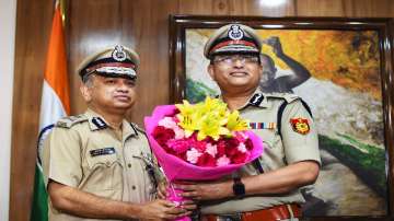 FILE | Newly-appointed Delhi Police Commissioner Rakesh Asthana takes charge from acting Commissioner Balaji Srivastav, at the Delhi Police Headquarters, New Delhi, Wednesday, July 28 , 2021.