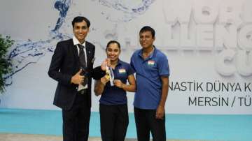Deepak Kabra (left) becomes first Indian gymnastics