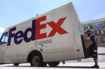 fedex to invest in Delhivery