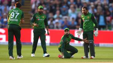 Pakistan bowler Shadab Khan reacts after catching England batsman Lewis Gregory.