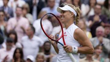 Germany's Angelique Kerber celebrates after defeating Coco Gauff of the U.S. during the women's singles fourth round match on day seven of the Wimbledon Tennis Championships in London, Monday, July 5