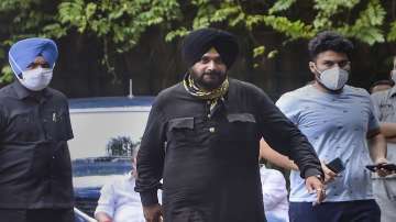 Punjab Congress MLA Navjot Singh Sidhu comes out from Congress war room after meeting with Congress panel on Punjab, in New Delhi.