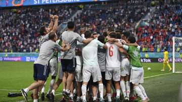 Spain players celebrate their win during the Euro 2020 soccer championship quarterfinal match between Switzerland and Spain, at the Saint Petersburg stadium in Saint Petersburg, Friday, July 2