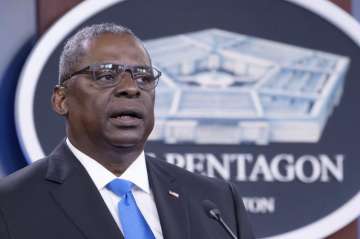 FILE - In this July 21, 2021 file photo, Defense Secretary Lloyd Austin speaks at a press briefing at the Pentagon in Washington. Austin has said he is working expeditiously to make the COVID-19 vaccine mandatory for military personnel and is expected to ask Biden to waive a federal law that requires individuals be given a choice if the vaccine is not fully licensed.