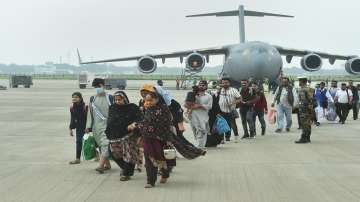 People who were stranded in crisis-hit Afghanistan arrive by a special repatriation flight of IAF