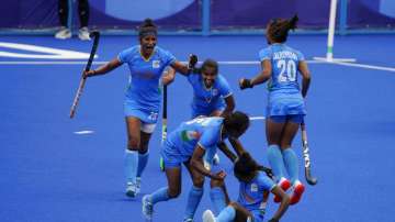 Team India celebrates after winning their women's field hockey match against Australia 