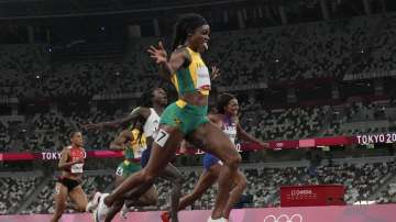 Elaine Thompson-Herah, of Jamaica, wins the final of the women's 200-meters at the 2020 Summer Olympics, Tuesday, Aug. 3, 2021, in Tokyo