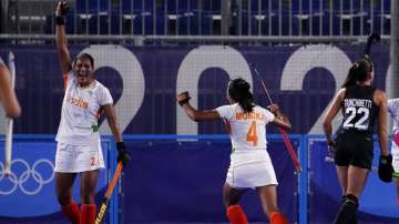 India's Gurjit Kaur celebrates with her teammates after scoring during a women's field hockey semi-f