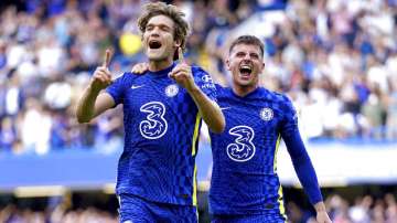 Chelsea's Marcos Alonso, left, celebrates scoring their side's first goal of the game with teammate 