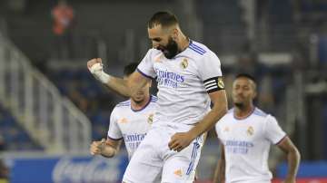 Real Madrid's Karim Benzema celebrates after scoring his side's opening goal during a Spanish La Liga soccer match between Alaves and Real Madrid at the Mendizorroza stadium in Vitoria, Spain, Saturday, Aug. 14