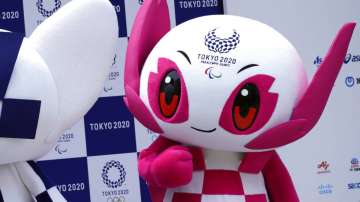 Tokyo 2020 Paralympic mascot "Someity" stands at stage during their debut event in Tokyo.