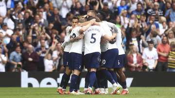 Tottenham players celebrate after Tottenham's Son Heung-min scored his side's opening goal during the English Premier League match between Tottenham Hotspur and Watford at the Tottenham Hotspur Stadium in London, Sunday, Aug. 29