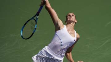 Karolina Pliskova, of the Czech Republic, serves to Catherine McNally, of the United States, during the first round of the US Open tennis championships, Tuesday, Aug. 31