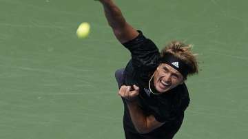 Alexander Zverev, of Germany, serves to Sam Querrey, of the United States, during the first round of the US Open tennis championships, Tuesday, Aug. 31