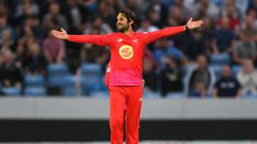 Welsh Fire bowler Qais Ahmad celebrates after taking the wicket of John Simpson during The Hundred match between Northern Superchargers Men and Welsh Fire Men at Emerald Headingley Stadium on July 24