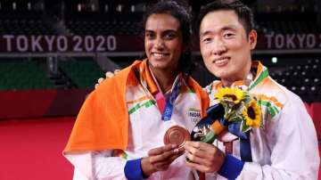 PV Sindhu and coach Park Tae-Sang after bronze medal win