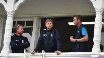 England coach, Paul Collingwood, captain Joe Root and Stuart Broad looks on during day five of the First Test Match between England and India at Trent Bridge on August 08