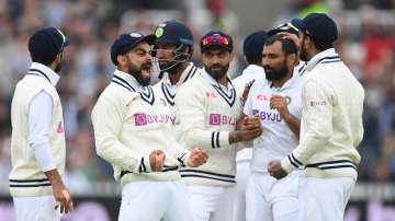 Virat Kohli celebrates along with teammates during the second Test against England at Lord's.