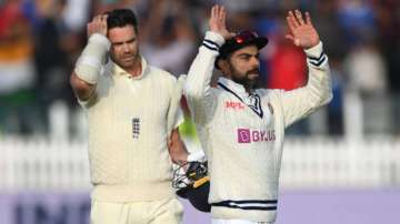 Virat Kohli celebrates as James Anderson reacts after day five of the second Test