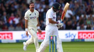 James Anderson celebrates after dismissing Virat Kohli