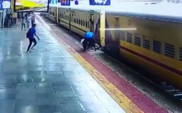 Video: Narrow escape for Indore woman after she falls while boarding moving train, saved by co-passengers