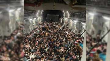 Afghans flee country in US military plane
