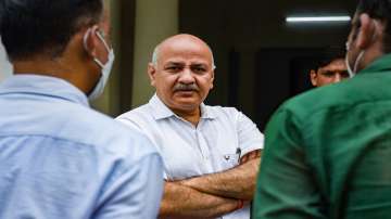 Delhis Deputy Chief Minister Manish Sisodia talks with media person during the Delhi Assembly session.