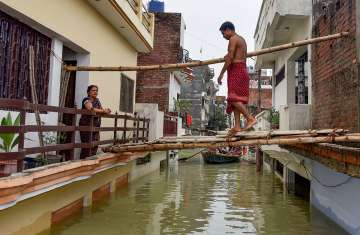 up bihar floods, ganga yamuna levels rise, monsoon 2021