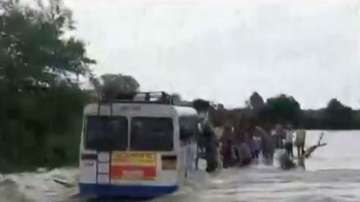 Rajasthan: Dramatic rescue operation of 40 passengers stuck in a bus in overflowing stream | WATCH VIDEO