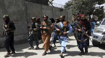 Taliban fighters patrol in Wazir Akbar Khan neighborhood in the city of Kabul, Afghanistan, Wednesday, Aug. 18, 2021.