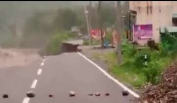 Uttarakhand: Road caves in, merges with river due to incessant rainfall in Dehradun | VIDEO