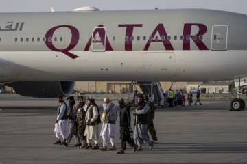 americans land in qatar from kabul