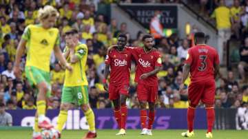Watford's Ismaila Sarr, center left, celebrates scoring during the English Premier League soccer match between Norwich City and Watford at Carrow Road, Norwich, England, Saturday Sept. 18