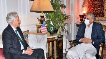 In this photo released by Inter Services Public Relations, visiting CIA Director William Burns, left, meets with Pakistan's Army Chief Gen. Qamar Javed Bajwa, in Rawalpindi, Pakistan.