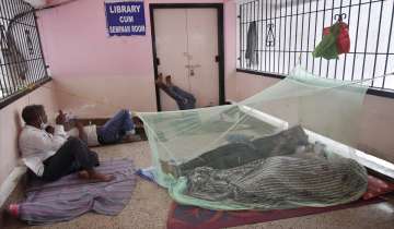 Dengue patients get treatment on the floor due to shortage of beds, amid surge in Covid-19 cases across the country.