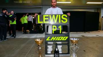Lewis Hamilton of Mercedes and Great Britain celebrates winning his 100th Grand Prix during the F1 Grand Prix of Russia at Sochi Autodrom?