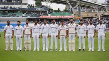 Indian team wears black-armbands in memory of Vasu Paranjpe