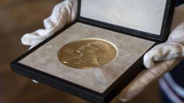 A view of the medal to be presented to Nobel Laureate in Physics Roger Penrose from the Swedish ambassador to the UK Torbjorn Sohlstrom at the ambassador's residence in London. 